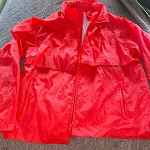 Herman’s Lightweight Windbreaker rain Jacket with Hide Away Hood